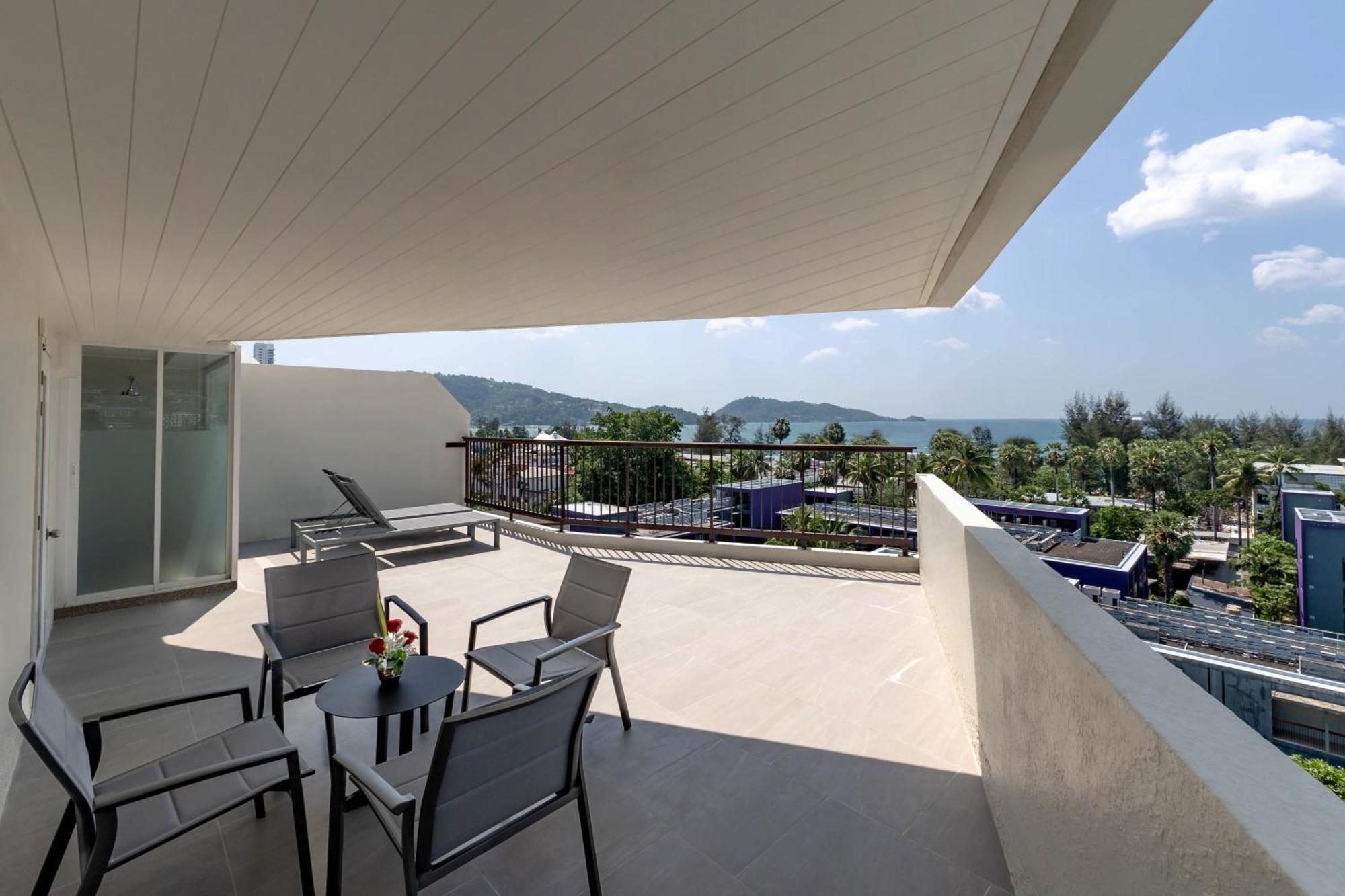 Andaman Embrace Patong, Phuket Hotel Exterior foto A balcony at a hotel in Phuket, Thailand