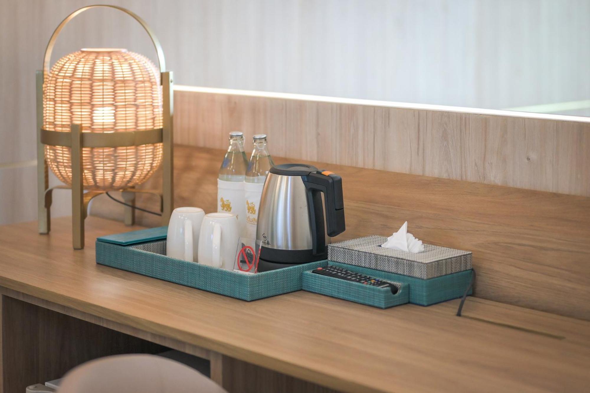 Andaman Embrace Patong, Phuket Hotel Exterior foto A tea tray in a hotel room